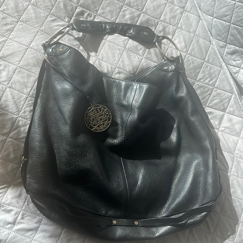 Large juicy couture handbag. Black leather